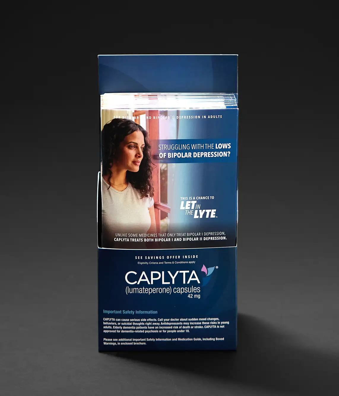 Caplyta drug packaging holder with Caplyta bruchures inside