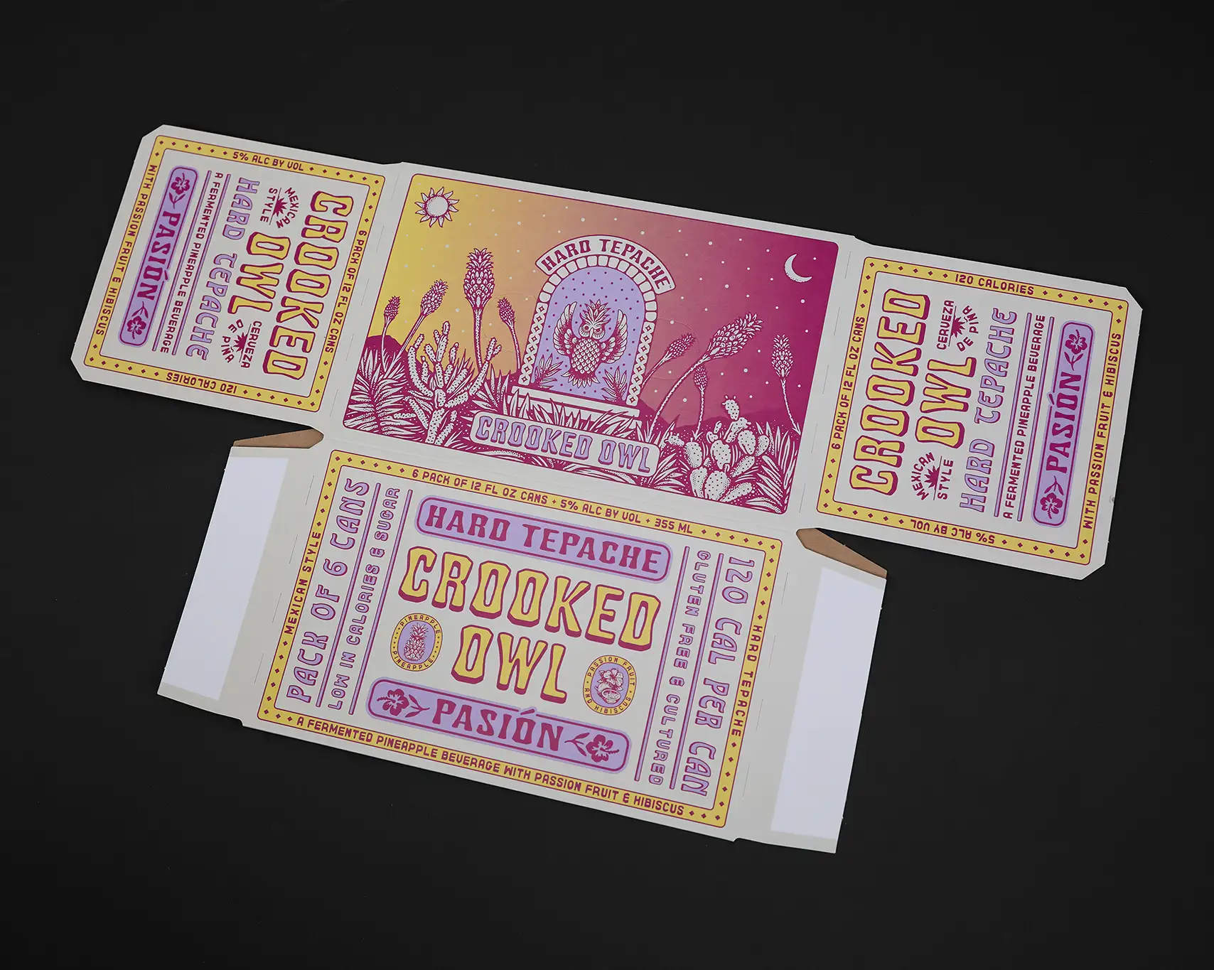 Colorful illustrated packaging for Crooked Owl Hard Tepache, featuring a stylized owl surrounded by desert plants in pink, purple, and yellow tones.